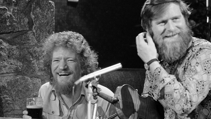 Legendary musician John Sheahan pictured with the late Luke Kelly, his fellow Dubliner.