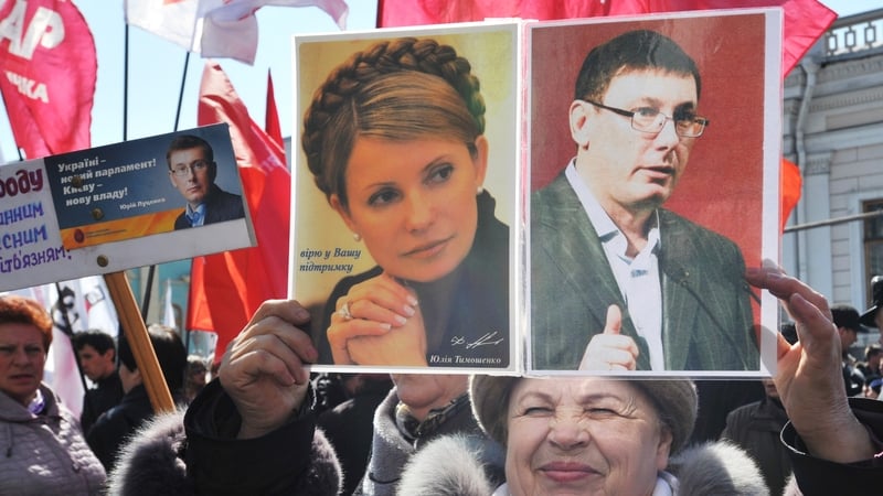 A woman calling for the release of Yulia Tymoshenko and Yuri Lutsenko at a protest last week