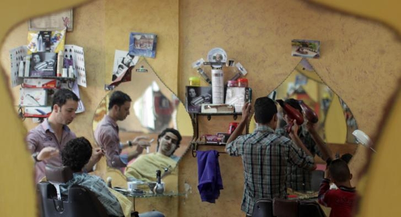 The deputy prime minister of Gaza, Ziad al-Zaza, said the head-shaving "was a very limited, isolated behavior of the police and is not going to continue."