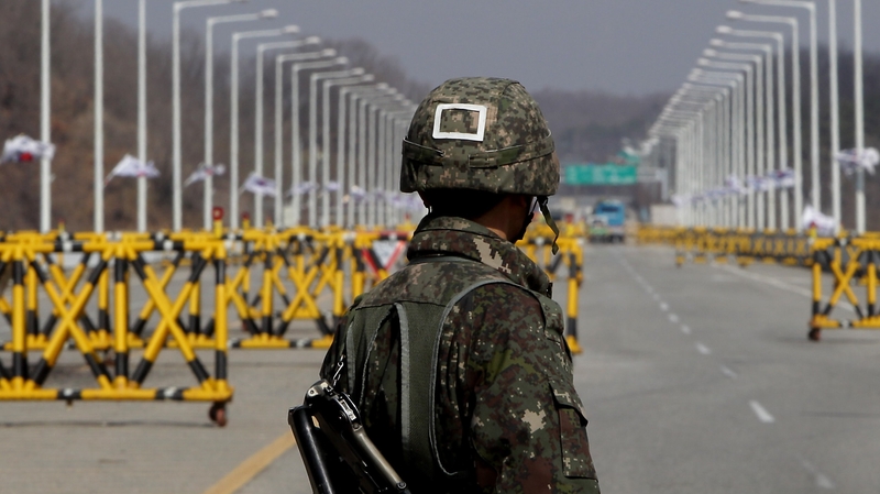 A South Korean soldier stands guard at the border with the North
