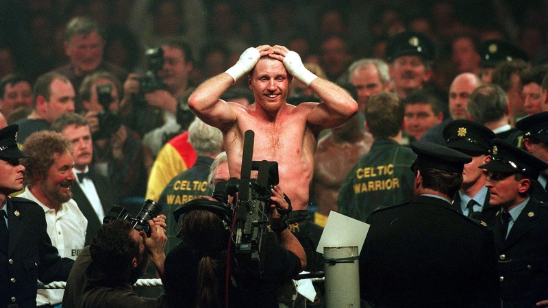 Stephen Collins celebrates after beating Chris Eubank in 1995