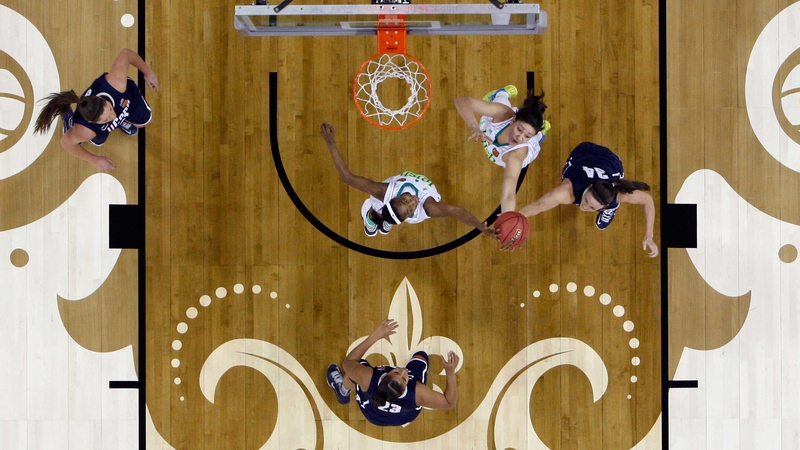 The Notre Dame Fighting Irish play the Connecticut Huskies in the Women's Basketball Championship at the New Orleans Arena