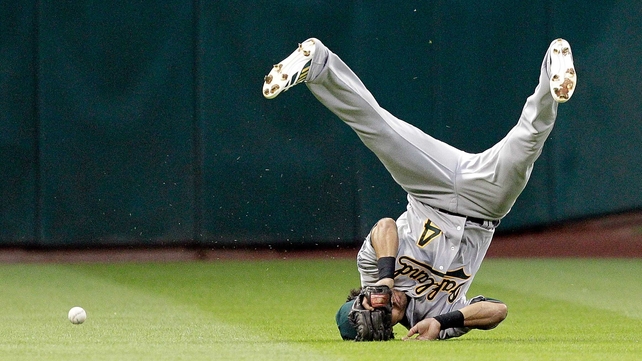 Coco Crisp of the Oakland Athletics comes up short on a sinking line drive at Minute Maid Park in Houston, Texas