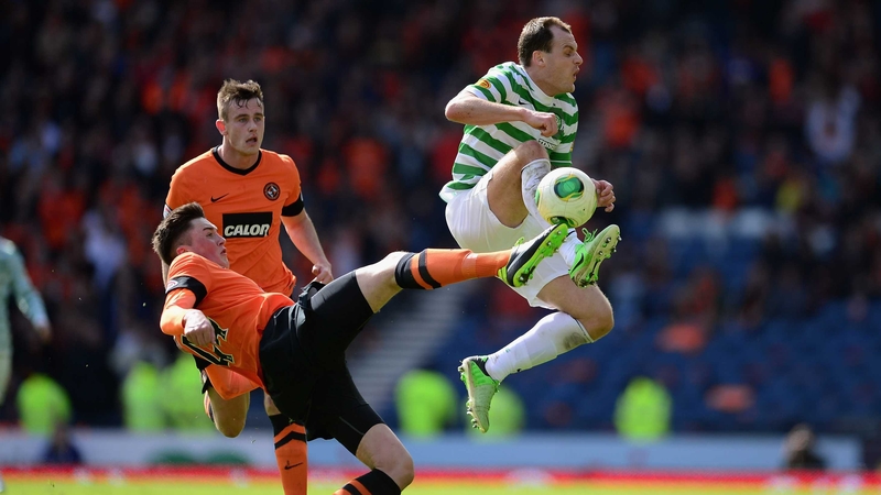 Anthony Stokes of Celtic battles with Mark Millar of Dundee United