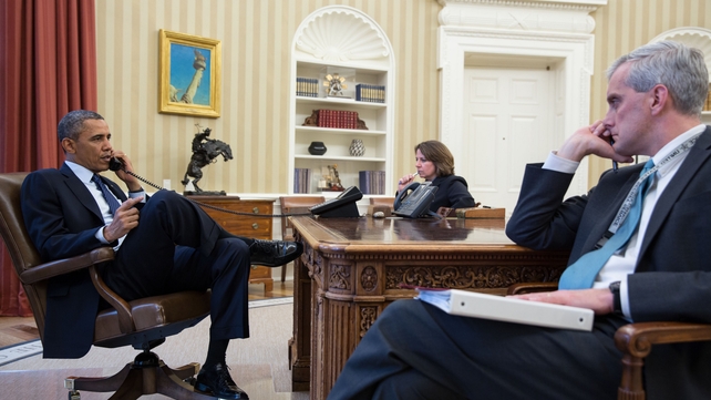 US President Barack Obama talks on the phone with FBI Director Robert Mueller to receive an update on the explosions