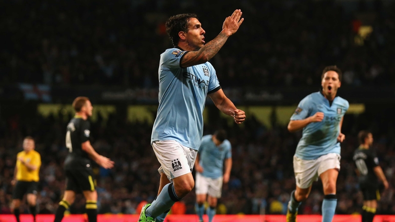 Carlos Tevez celebrates his winning strike