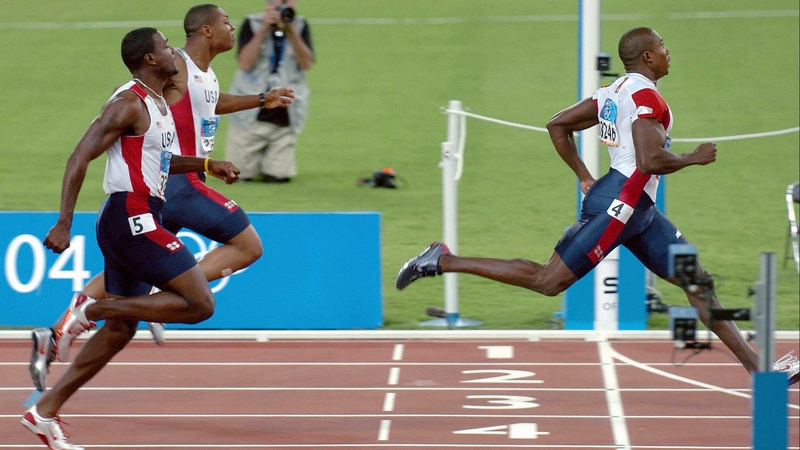 Shawn Crawford crosses the line for gold in Athens