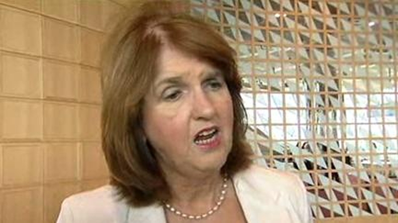 Joan Burton said it would be preferable if Eamon Gilmore was able to work full-time in a ministry at home