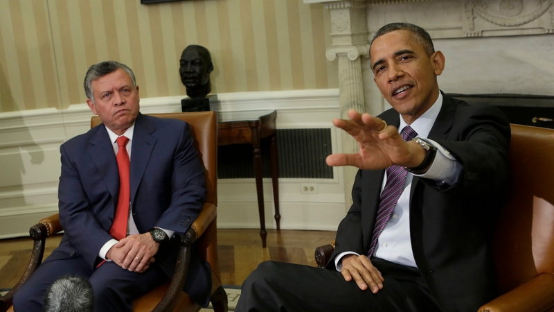 US President Barack Obama (R) speaks to the media with King Abdullah II of Jordan (L) before holding a bilateral meeting at the White House