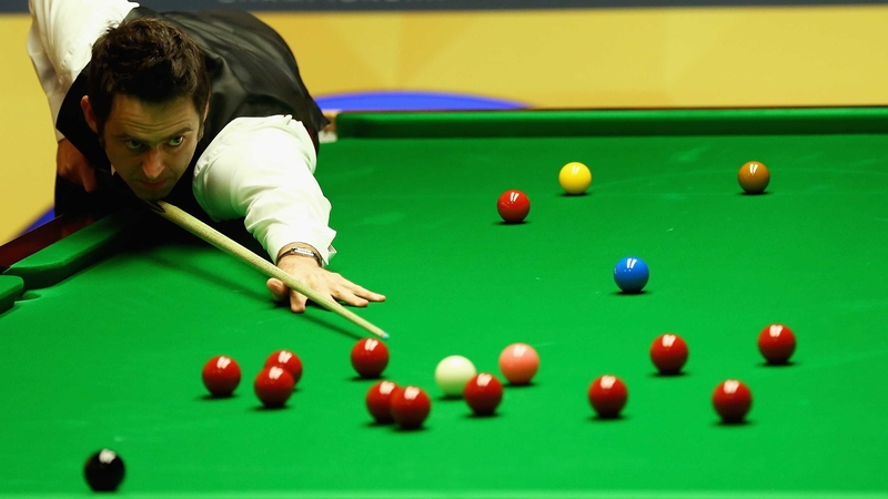 Ronnie O'Sullivan holds a 9-7 lead over Ali Carter