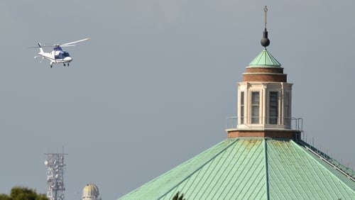 The helicopter carrying Pope emeritus Benedict XVI lands at the Vatican