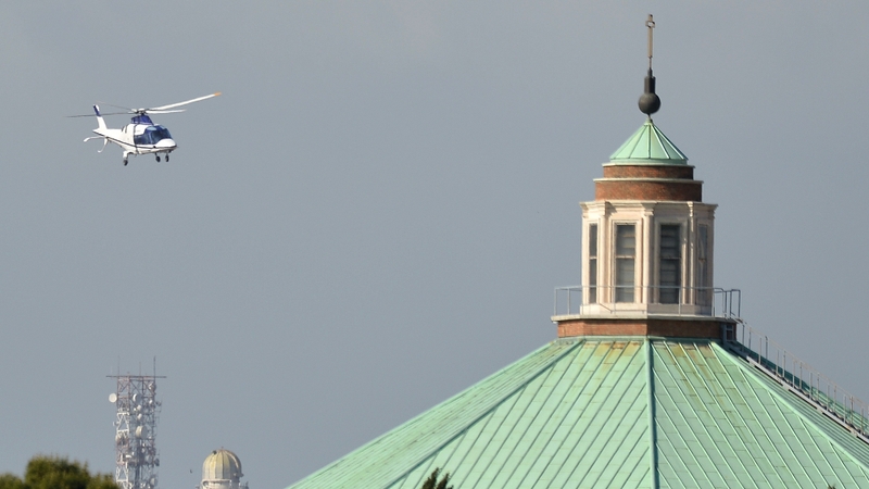 The helicopter carrying Pope emeritus Benedict XVI lands at the Vatican