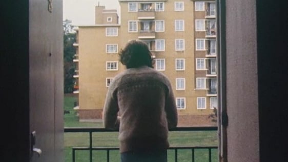A young Irish man on the balcony of a Brixton flat. An image from a report on Irish emigration to L…