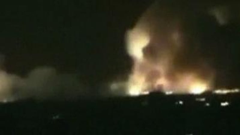 At least 62 people overnight and left bloodied and burned corpses piled in the streets