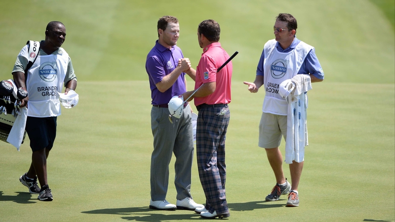 Graeme McDowell is congratulated by Branden Grace in Bulgaria this morning