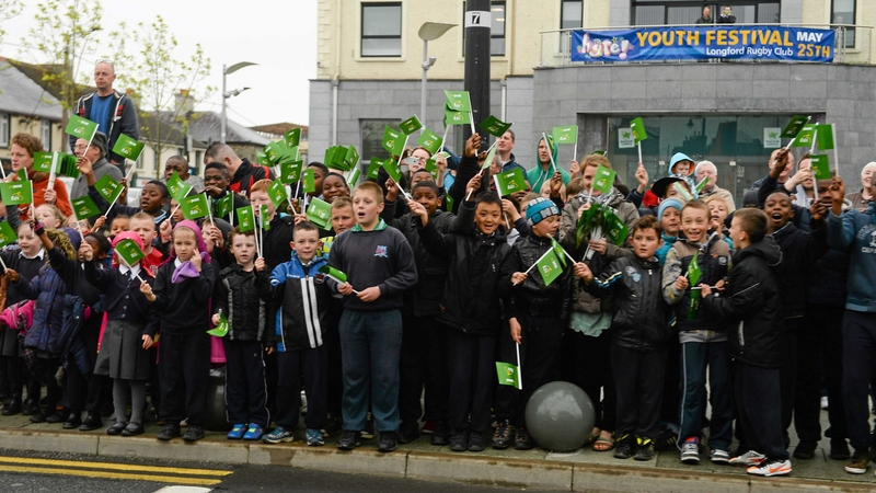A group of chilrdren in Longford town cheer on the riders at the start of stage two