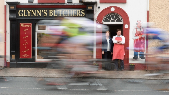 Butcher John Glynn an his mother Eileen watch competitors in action in Ahascragh, Co Galway