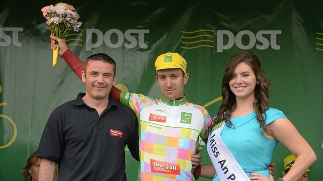 Martin Hunal of the AC Sparta Praha Team holds the One4All king of the mountains jersey