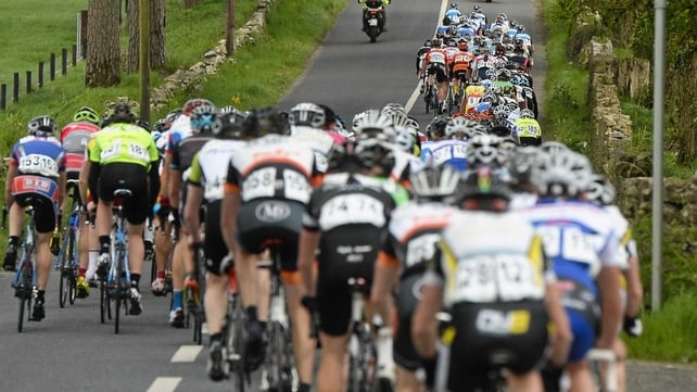 The riders head uphill