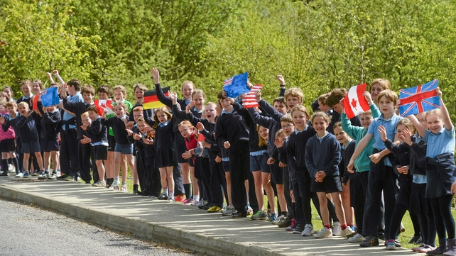 School children cheer on the Rás at Ballylickey, Co Cork