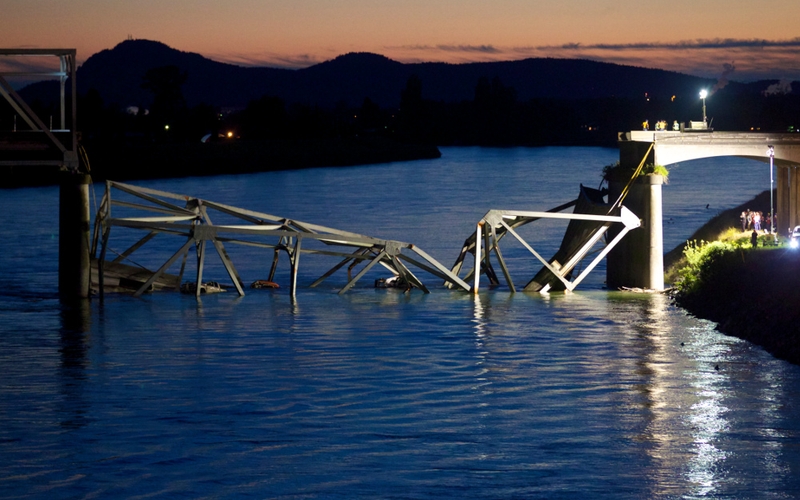 A number of vehicles plunged into the water, with two people treated for hypothermia