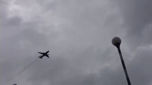 Eyewitnesses described seeing smoke coming from the plane, with the right engine on fire