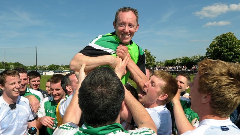 London manager Paul Coggins with his players