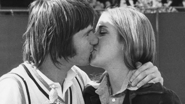 American tennis player Jimmy Connors kisses his fiancee Chris Evert after winning the men's singles final at Wimbledon, London, 6th July 1974. Evert had just won the women's singles.