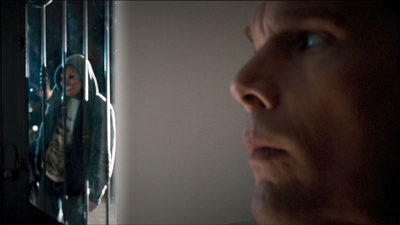 Ethan Hawke deals with some very scary people outside his front door - or, more accurately, sliding wall of stainless steel