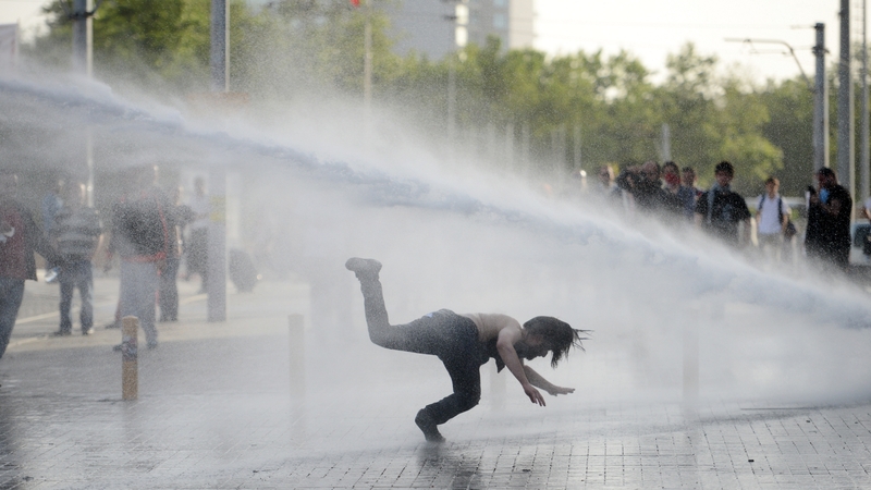 Smoke bombs and water cannons were used to disperse the protestors