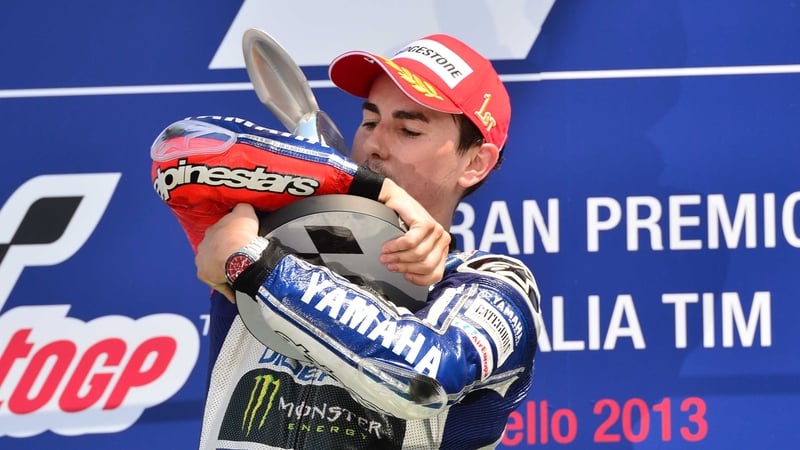 Jorge Lorenzo celebrates on the podium