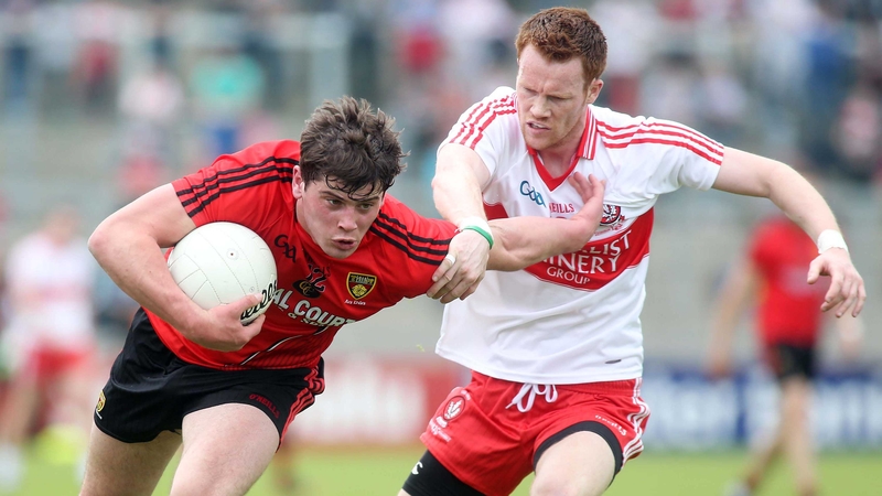 Down's Niall Madine gets away from Aidan McAlynn