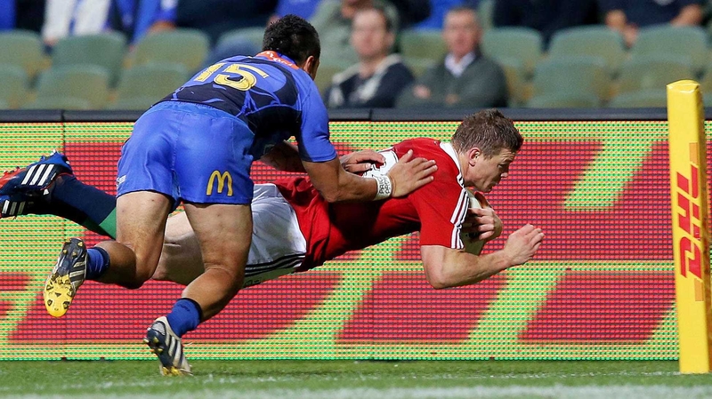 Brian O'Driscoll scores the first of his two tries