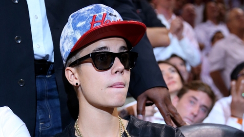 Justin Bieber slammed for spitting on fans