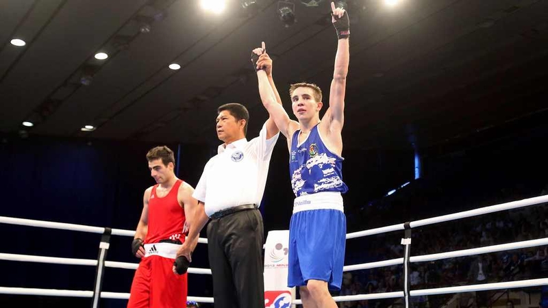 Michael Conlan has his hand raised in victory against Ovik Ogannisian