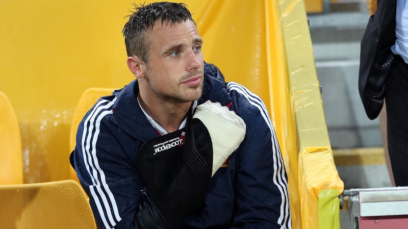 Tommy Bowe looked despondent on the bench