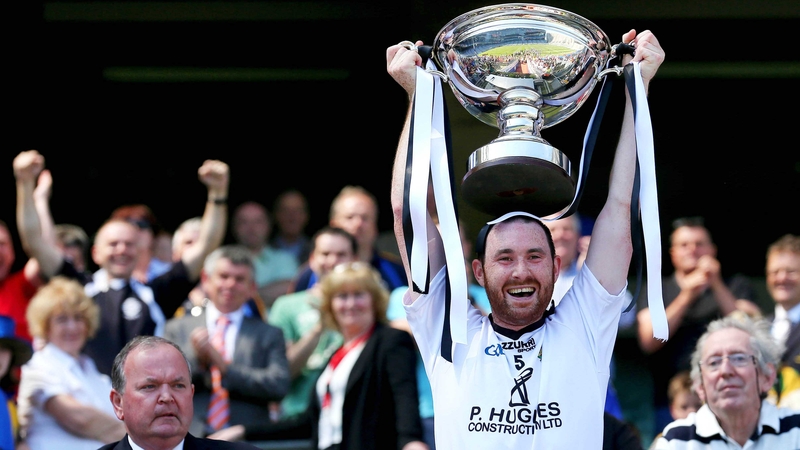 Conal Maskey lifts the Lory Meagher Cup