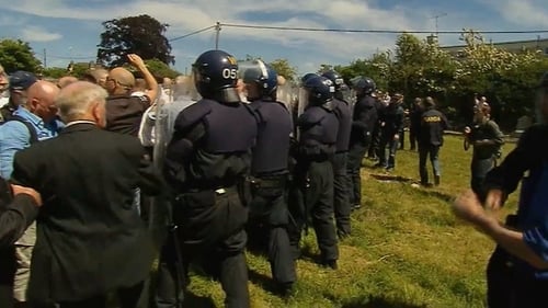 A number of gardaí in riot gear were present for the funeral