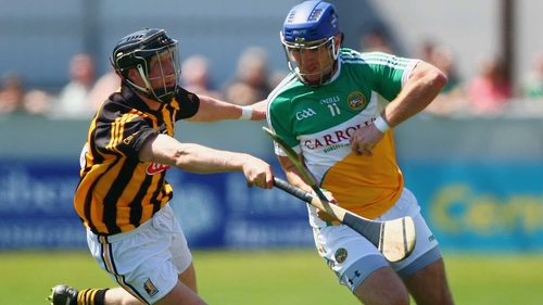 Offaly's Brian Carroll is tackled by Kilkenny's Aidan Fogarty