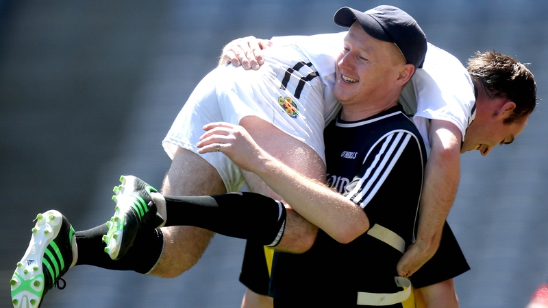 Warwickshire manager Stephen Ahern and Alan Morrissey celebrate after winning the Lory Meagher final against Longford