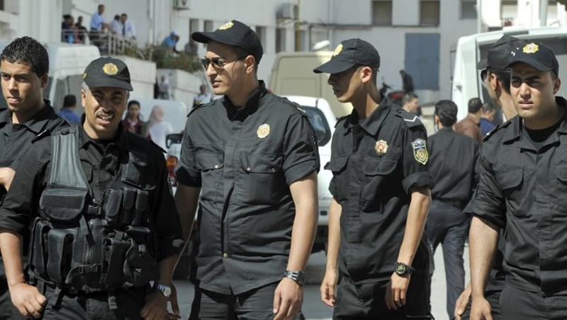 Tight security surrounded the Tunis court where three women were sentenced to four months in jail over protest