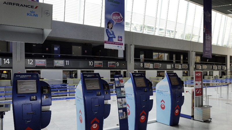 Empty boarding desks at Montpellier's airport during the strike action