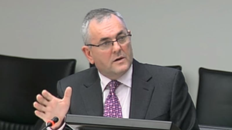 John McGuinness has been criticised for bringing his wife on government trips