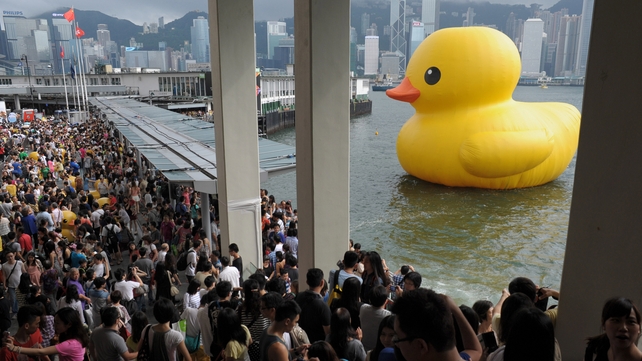 Thousands say farewell to a giant rubber duck conceived by Dutch artist Florentijn Hofman, before it heads to the United States