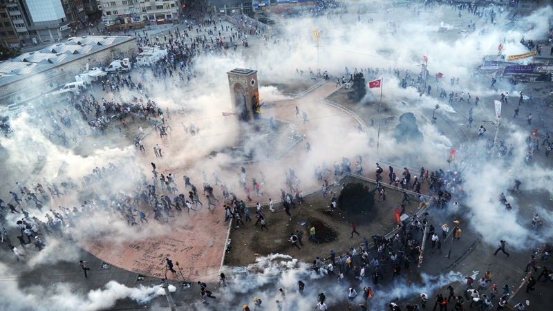 Turkish police fired volleys of tear gas and jets of water to disperse anti-government demonstrators in Istanbul's Taksim Square