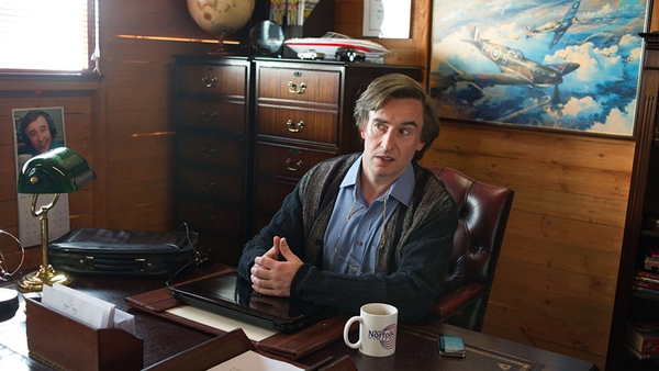 Alan at home. Roger Moore portrait not pictured