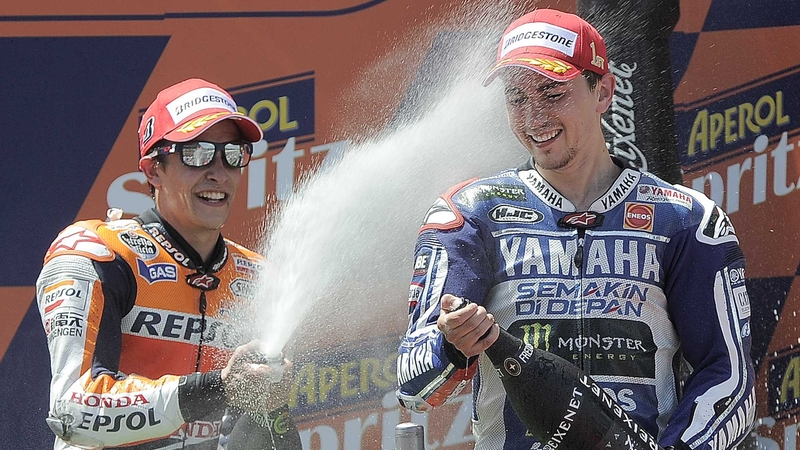 Jorge Lorenzo (r) and Marc Marquez (l) celebrate on the podium