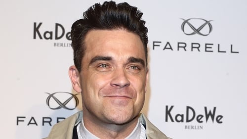 Robbie Williams will release his new swing album in time for Christmas