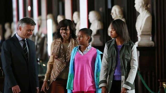 Michelle Obama and daughters Malia and Sasha speak with Trinity Provost Dr Patrick Prendergast in the Long Hall Library