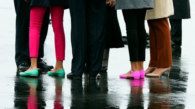The Obamas arrived at a rain swept Belfast International Airport